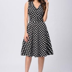 Robe noir a pois blanc